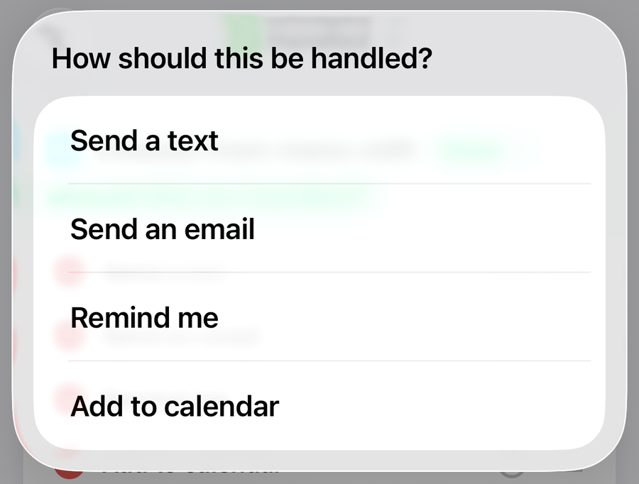 The menu that appears when you run Handled, asking How should this be handled? with Send a text, Send an email, Remind me and Add to calendar